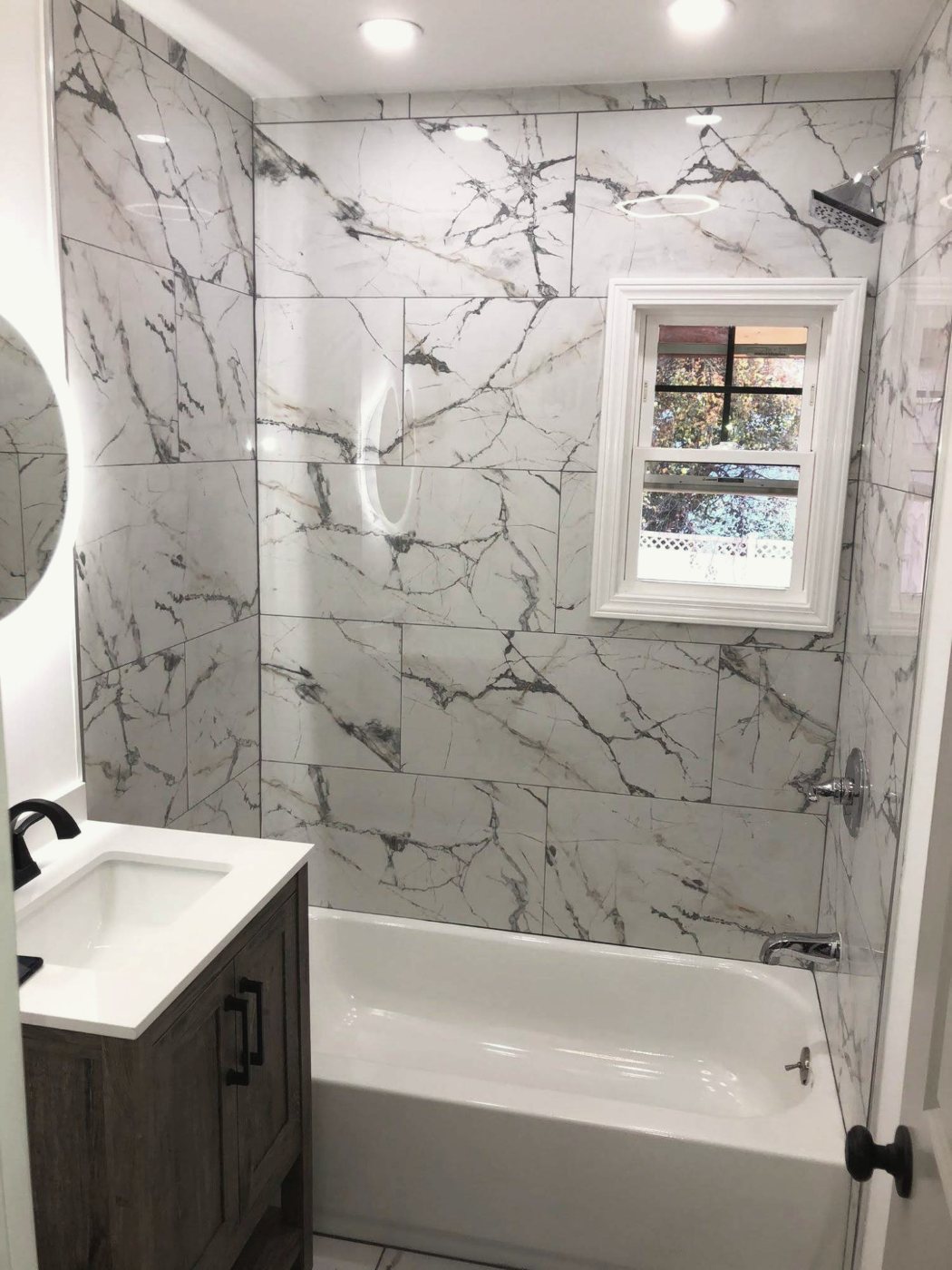 Marble-look tile around a bathtub